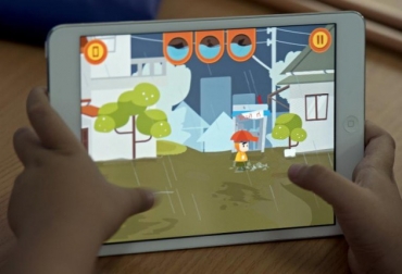 Foto del 13 de marzo de 2014 en una escuela de Ayutthaya, Tailandia, donde un alumno utiliza un videojuego concebido a pedido de la UNESCO para educar a los niños del sudeste asiático en cómo sobrevivir a las inundaciones. Foto: AFP / Pornchai Kittiwongsakul. videojuego inundaciones